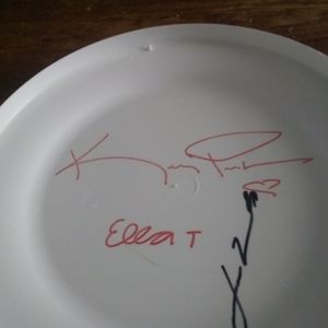 Frisbee signed by John Travolta and his family